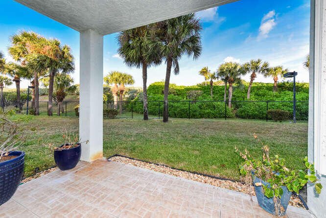 602 Mainsail Circle Jupiter, FL 33477 - Photo 15 of 39 a view of a garden with a tree