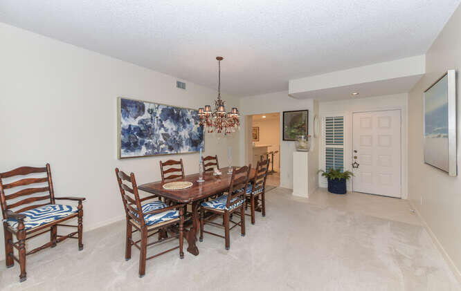602 Mainsail Circle Jupiter, FL 33477 - Photo 22 of 39 a view of a dining room with furniture