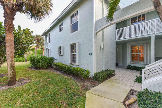602 Mainsail Circle Jupiter, FL 33477 - Photo 25 of 39 a view of a house with a yard
