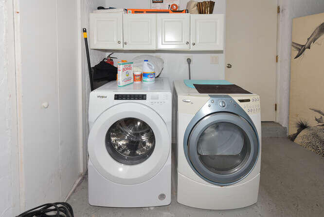 602 Mainsail Circle Jupiter, FL 33477 - Photo 28 of 39 a utility room with sink dryer and washer