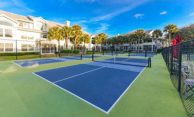 602 Mainsail Circle Jupiter, FL 33477 - Photo 30 of 39 a view of an outdoor space and tennis court