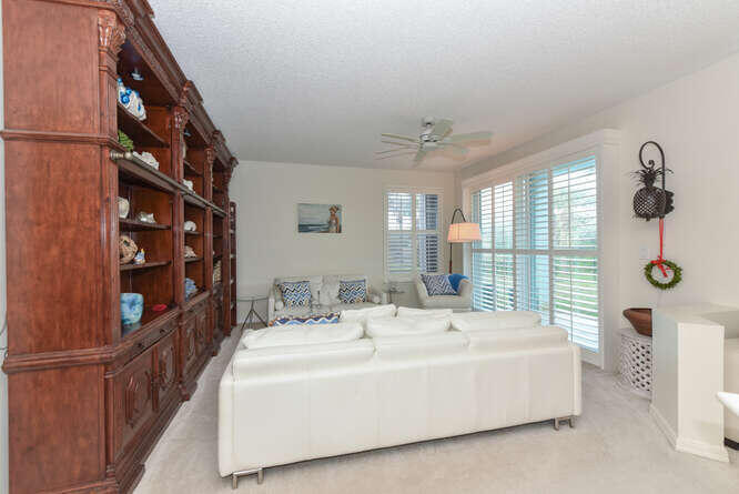 602 Mainsail Circle Jupiter, FL 33477 - Photo 6 of 39 a spacious bedroom with a bed and a window