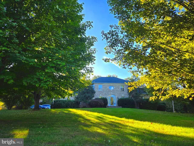 a view of a house with a big yard