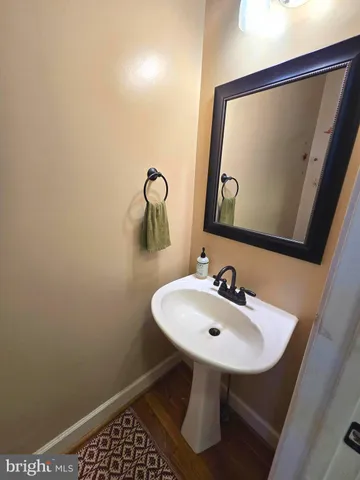 a bathroom with a sink and a shower