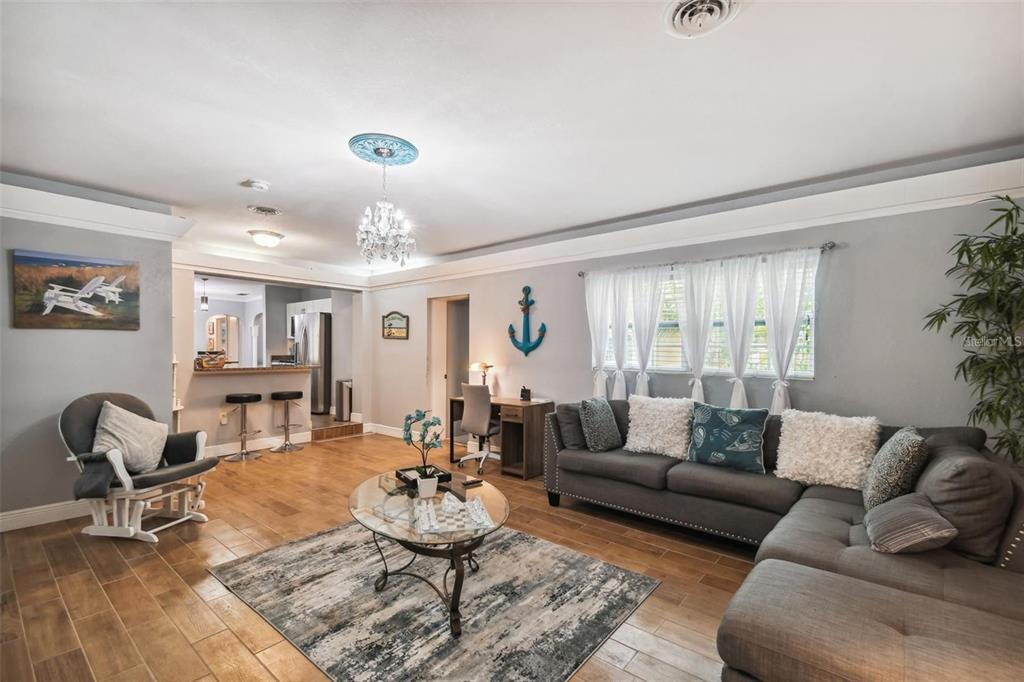 3915 North Ridge Avenue Tampa, FL 33603 - Photo 21 of 52 a living room with furniture and wooden floor
