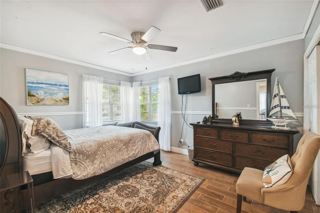 3915 North Ridge Avenue Tampa, FL 33603 - Photo 28 of 52 a bedroom with a bed and a mirror