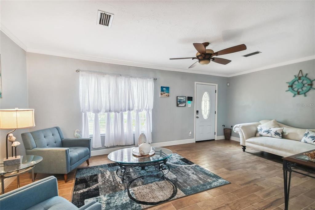3915 North Ridge Avenue Tampa, FL 33603 - Photo 3 of 52 a living room with furniture and a window