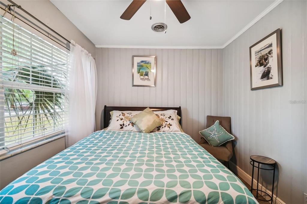 3915 North Ridge Avenue Tampa, FL 33603 - Photo 32 of 52 a bedroom with a large bed and a window