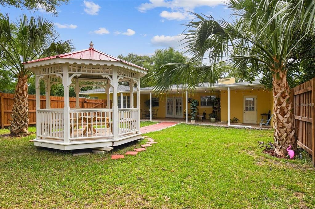 3915 North Ridge Avenue Tampa, FL 33603 - Photo 41 of 52 a front view of a house with a garden