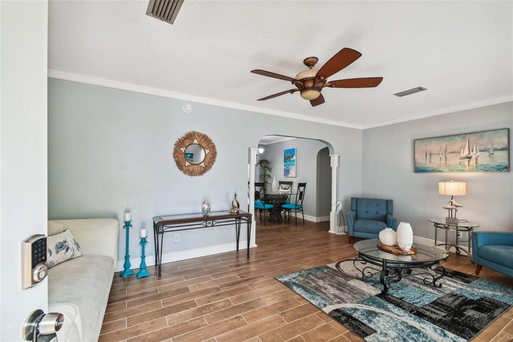 3915 North Ridge Avenue Tampa, FL 33603 - Photo 5 of 52 a living room with furniture and a wooden floor