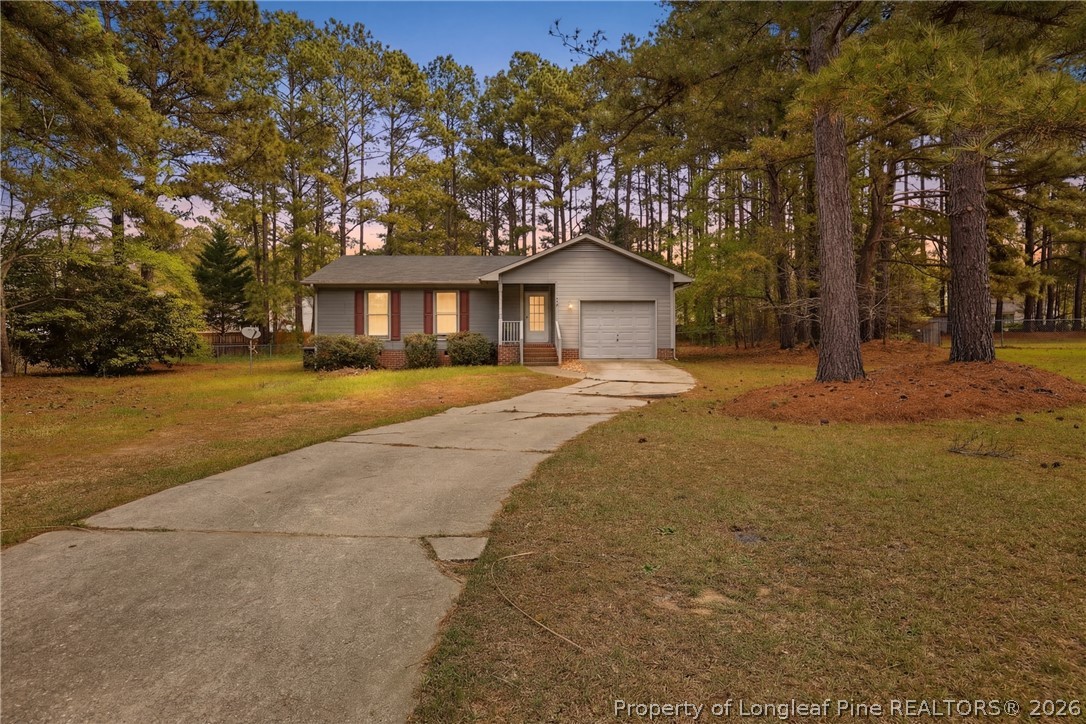 207 Cobblestone Court Raeford, NC 28376 - Photo 1 of 35 a view of a house with a yard