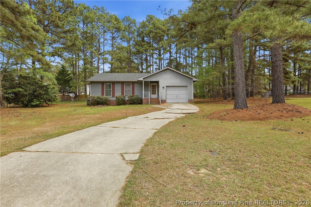 207 Cobblestone Court Raeford, NC 28376 - Photo 3 of 35 a view of a house with a yard
