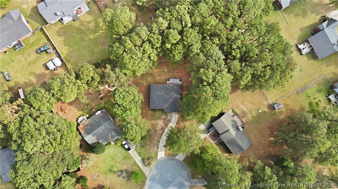 207 Cobblestone Court Raeford, NC 28376 - Photo 35 of 35 an aerial view of a house with a yard and garden