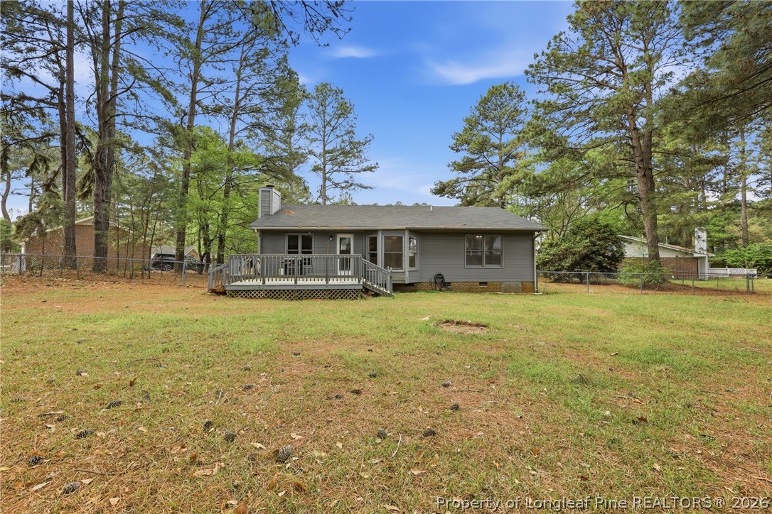 207 Cobblestone Court Raeford, NC 28376 - Photo 6 of 35 a front view of a house with a garden