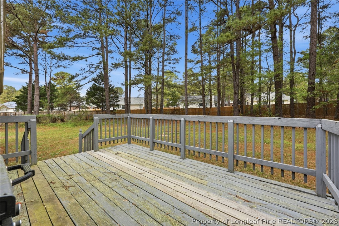 207 Cobblestone Court Raeford, NC 28376 - Photo 7 of 35 a view of a balcony with a lake view