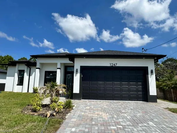 $349,900 | 1247 Earnest Street East, Lehigh Acres, FL 33974