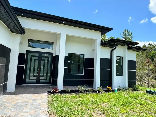 front view of a house with yard