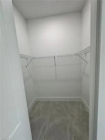 a view of a room with racks on the wall