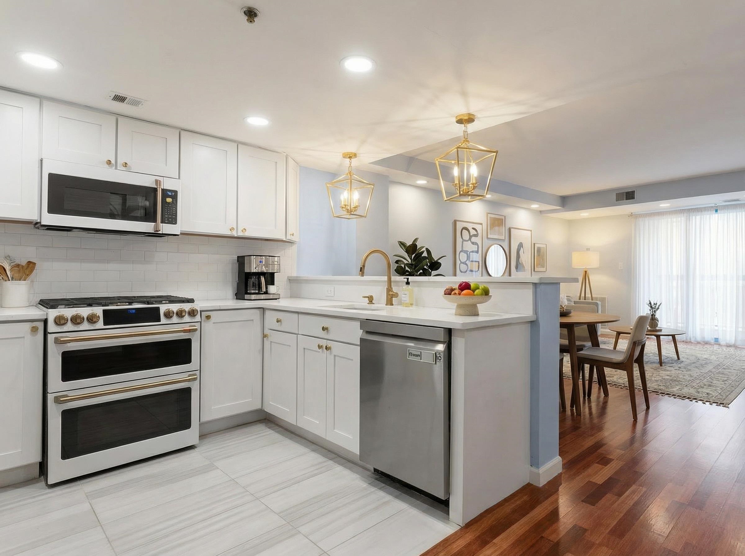 a kitchen with a sink stove and cabinets