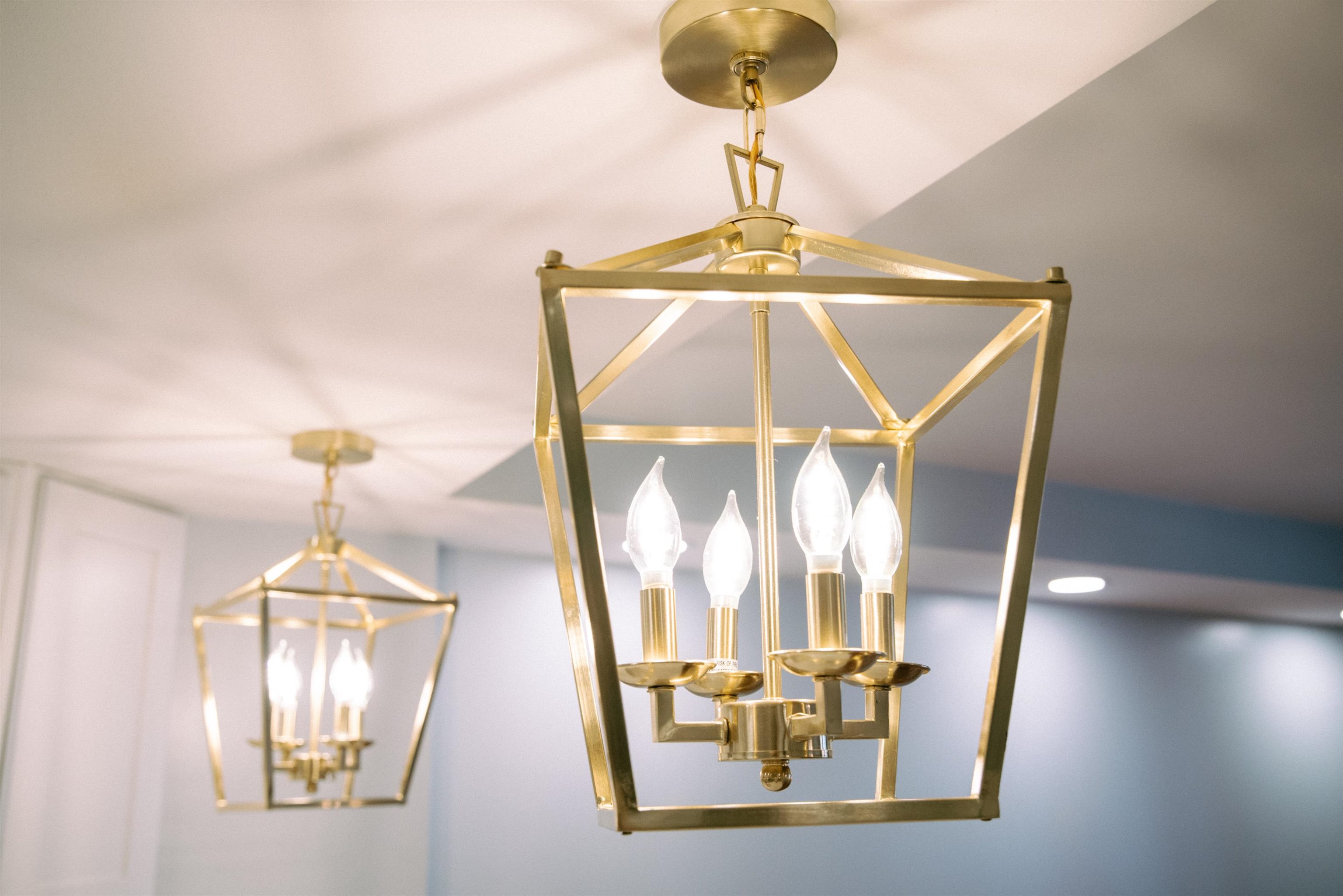 700 1st Street, Unit 5B Hoboken, NJ 07030 - Photo 11 of 14 a front view of a dining room with wooden floor chandelier and entryway