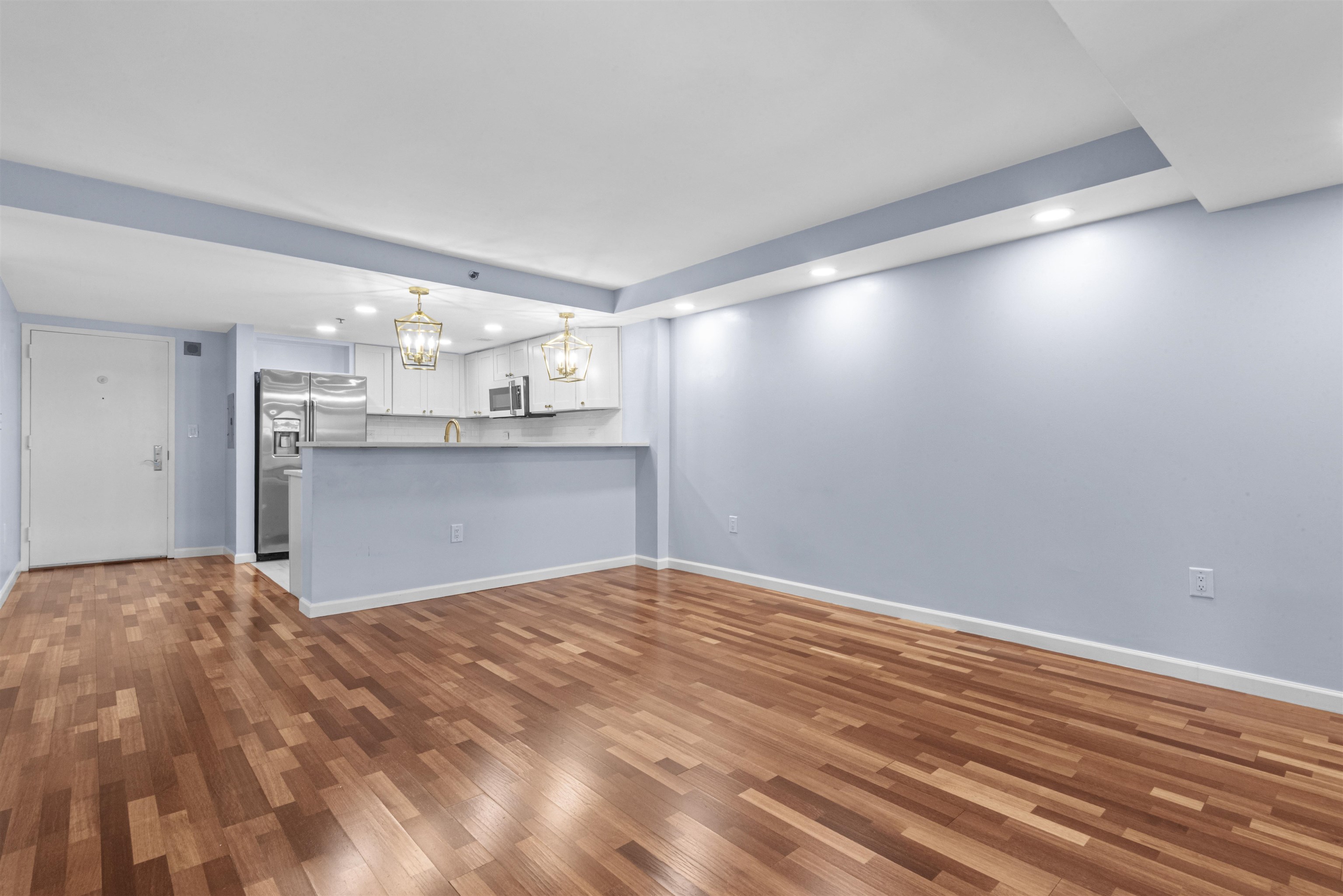 700 1st Street, Unit 5B Hoboken, NJ 07030 - Photo 4 of 14 a view of a kitchen with microwave and cabinets