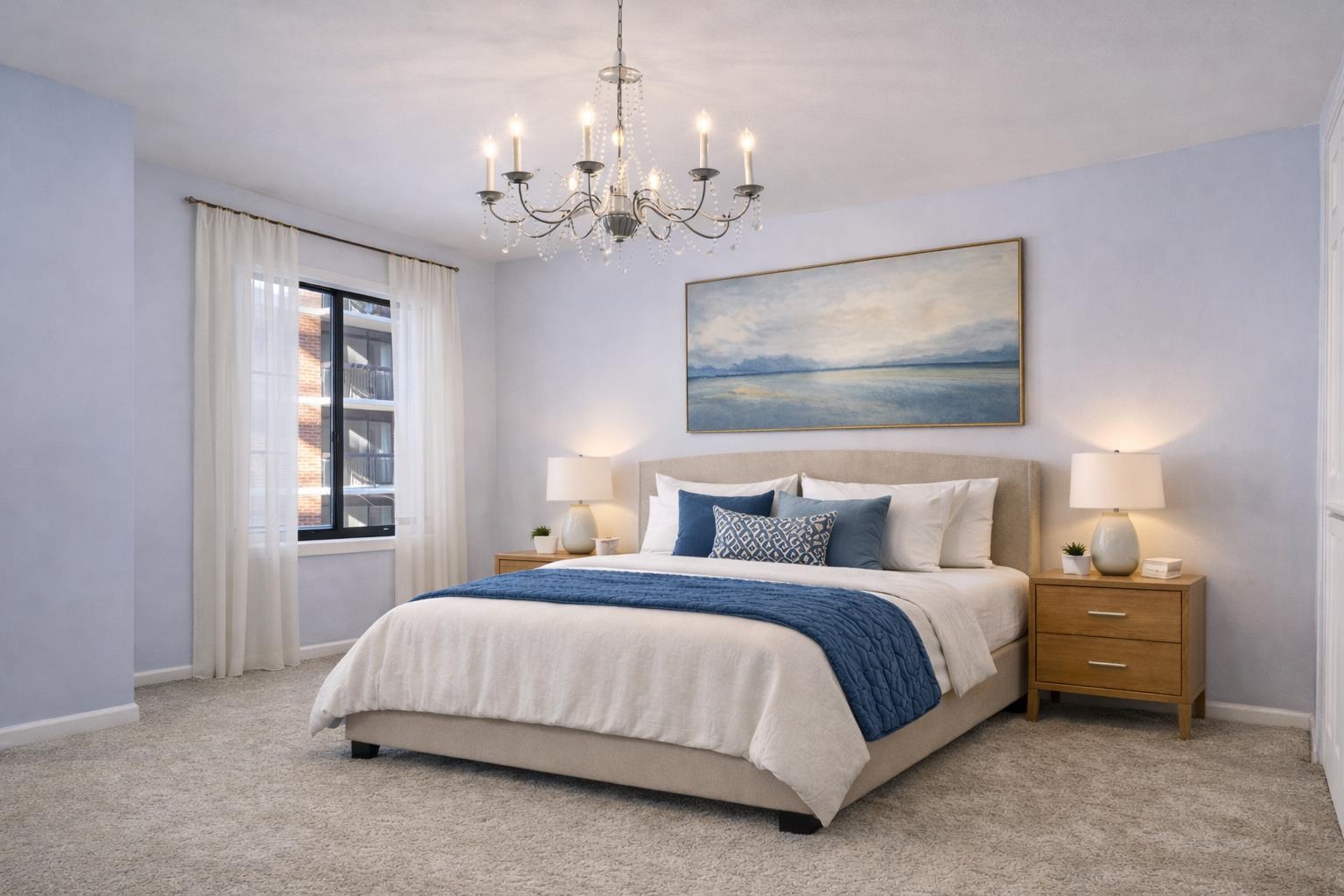 700 1st Street, Unit 5B Hoboken, NJ 07030 - Photo 6 of 14 a bedroom with bed and a chandelier