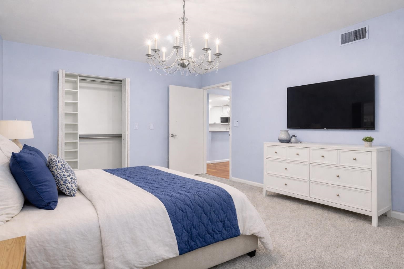 700 1st Street, Unit 5B Hoboken, NJ 07030 - Photo 7 of 14 a bedroom with a bed and flat screen tv