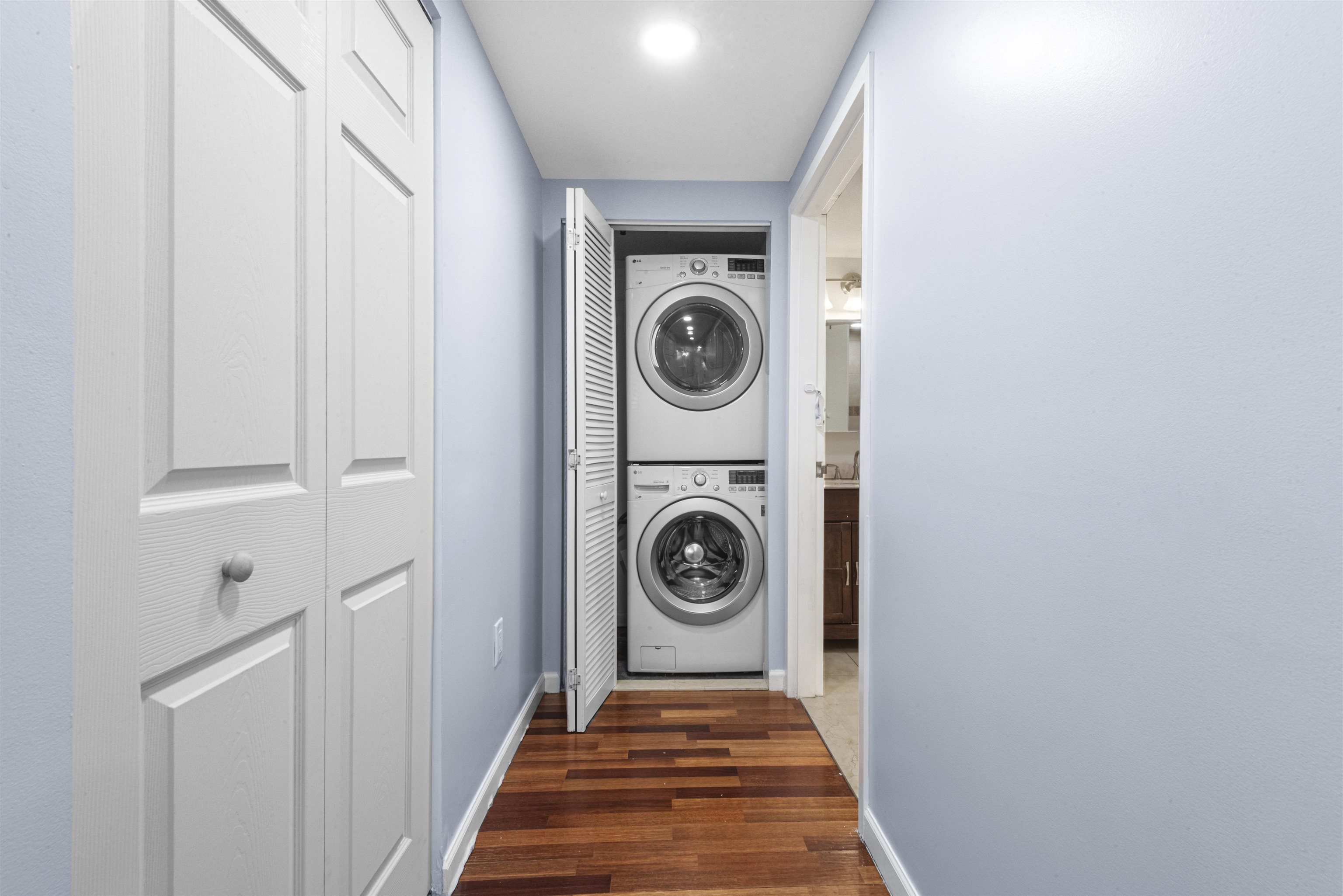 700 1st Street, Unit 5B Hoboken, NJ 07030 - Photo 8 of 14 a view of washer and dryer in a utility room