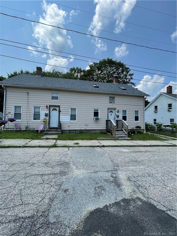 23 St James Row Killingly, CT 06239 - Photo 1 of 1 a view of a house with a backyard and a sitting area