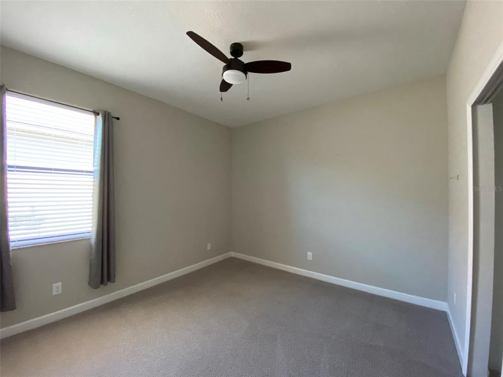 10049 Victory Gallop Loop Ruskin, FL 33573 - Photo 12 of 22 an empty room