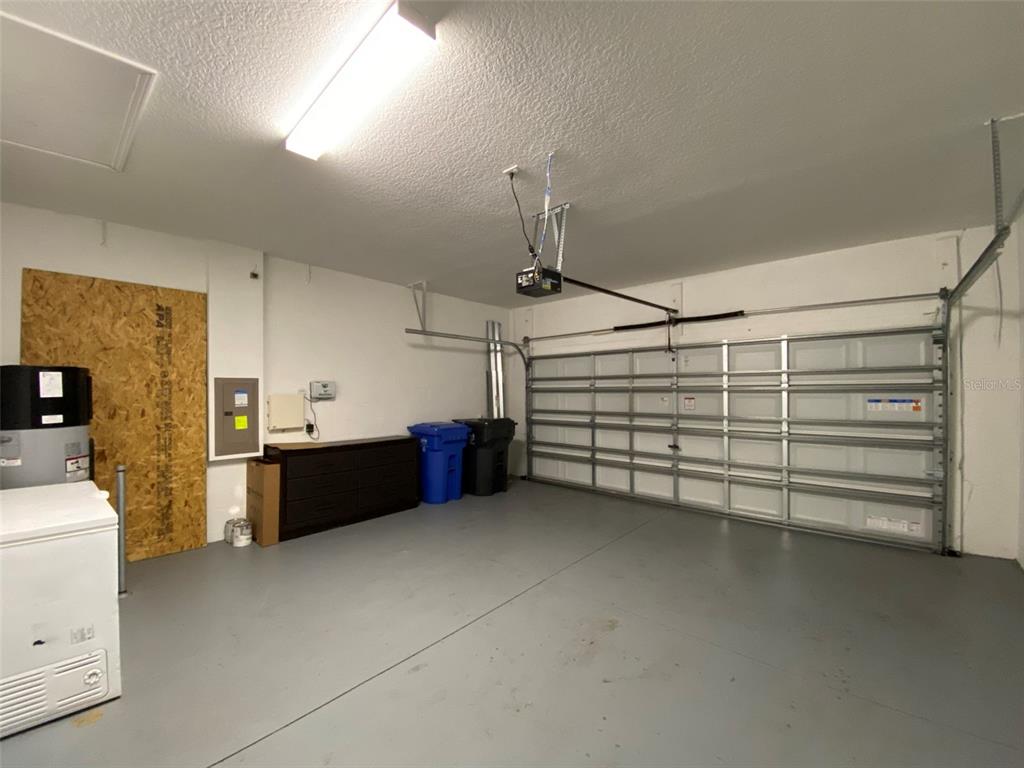 10049 Victory Gallop Loop Ruskin, FL 33573 - Photo 19 of 22 a view of a garage room
