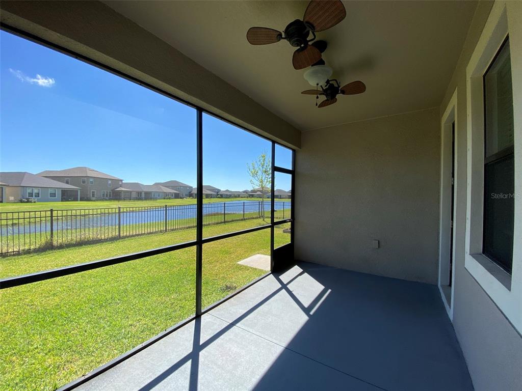 10049 Victory Gallop Loop Ruskin, FL 33573 - Photo 20 of 22 a view of outdoor space with seating area