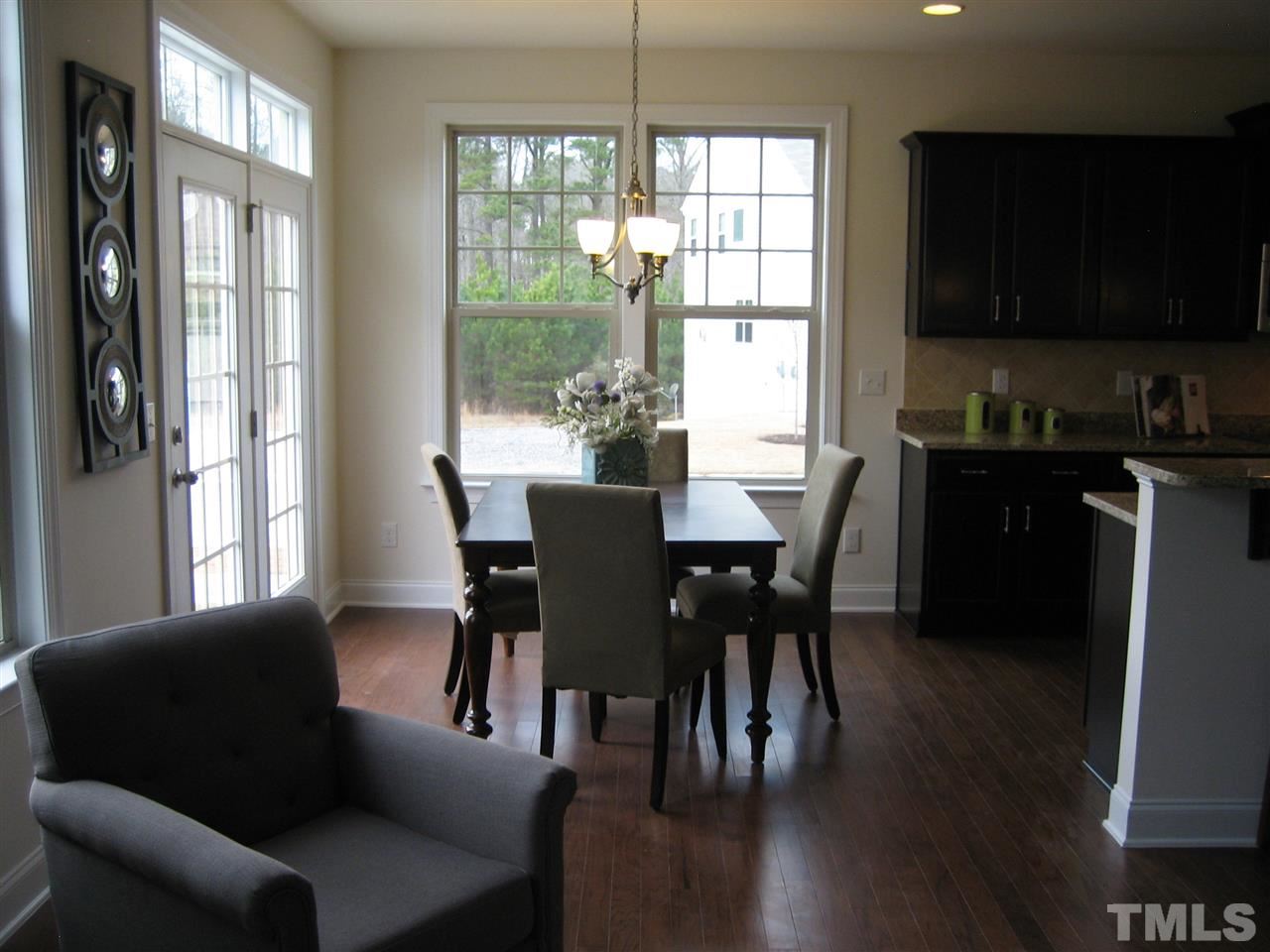2445 Everstone Road Wake Forest, NC 27587 - Photo 8 of 22 Lots of Natural light. Breakfast area open Family.