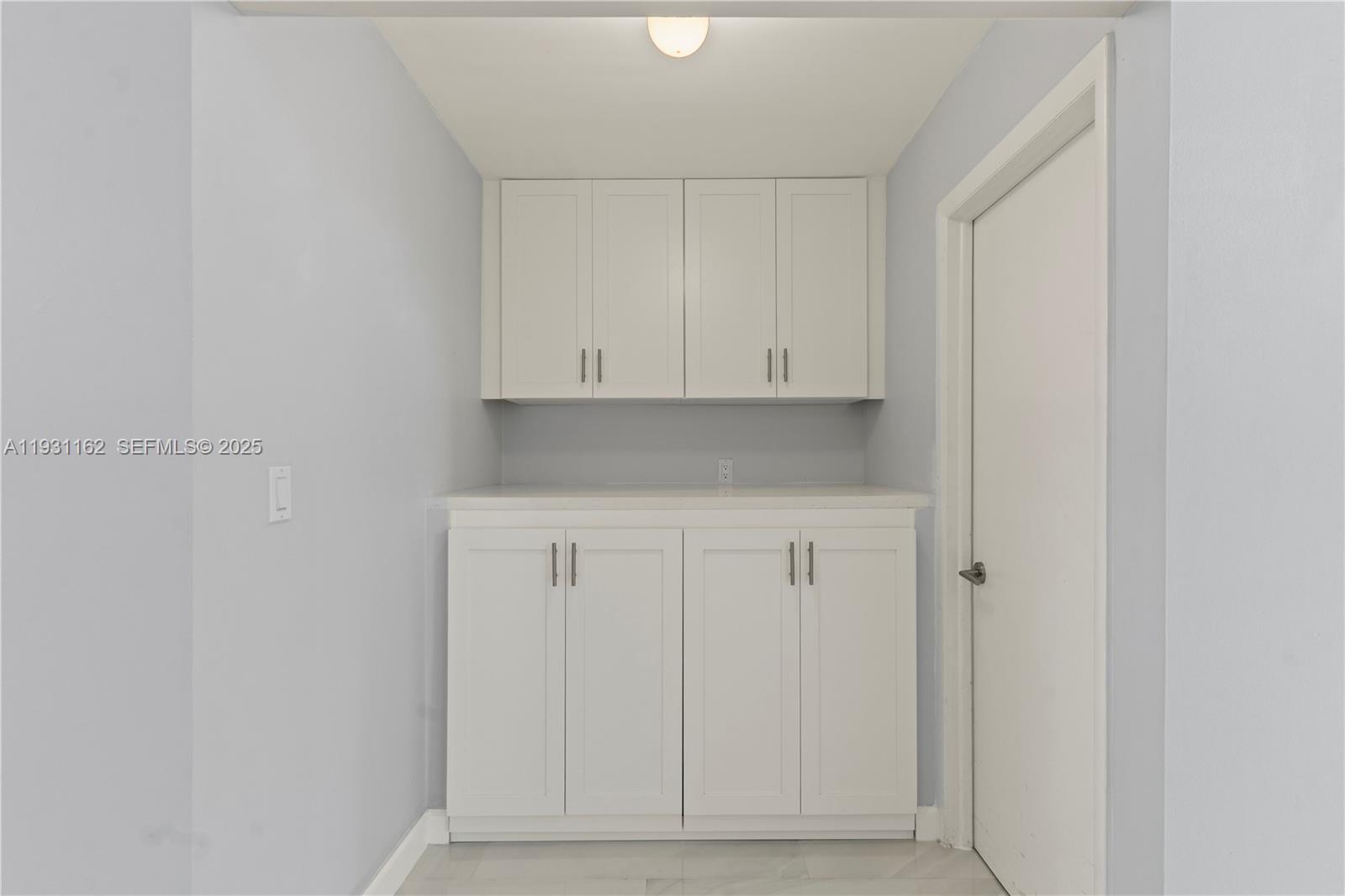 9301 Southwest 130th Street Miami, FL 33176 - Photo 16 of 32 a view of cabinets and window