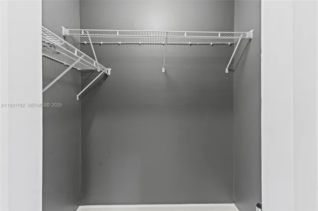 a view of a room with racks on the wall
