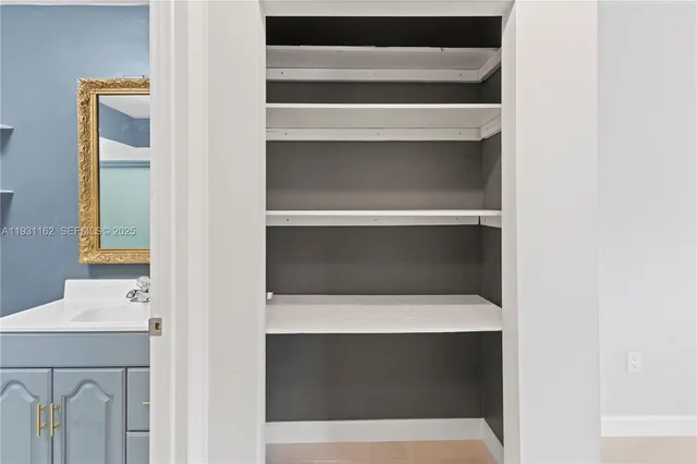 a utility room with washing machine