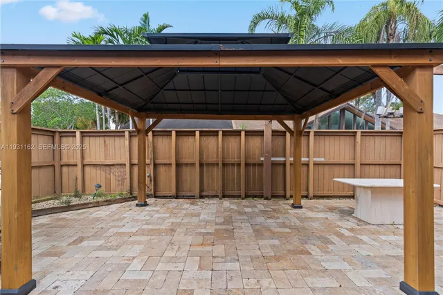 a view of a backyard of a house