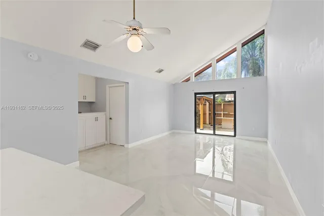 a view of an empty room with window