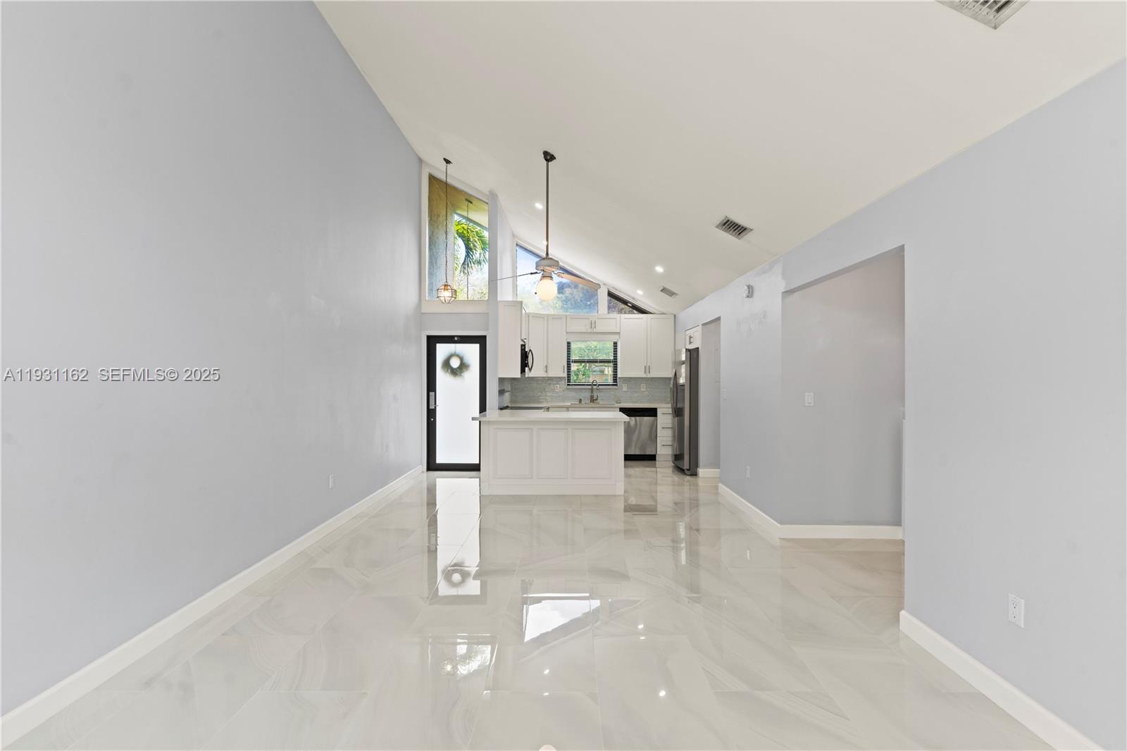 9301 Southwest 130th Street Miami, FL 33176 - Photo 6 of 32 a view of kitchen with furniture and refrigerator