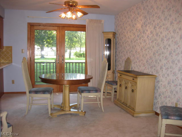 3288 Oser Road Norton, OH 44203 - Photo 4 of 25 Dining area features Anderson french doors which lead to the back deck.