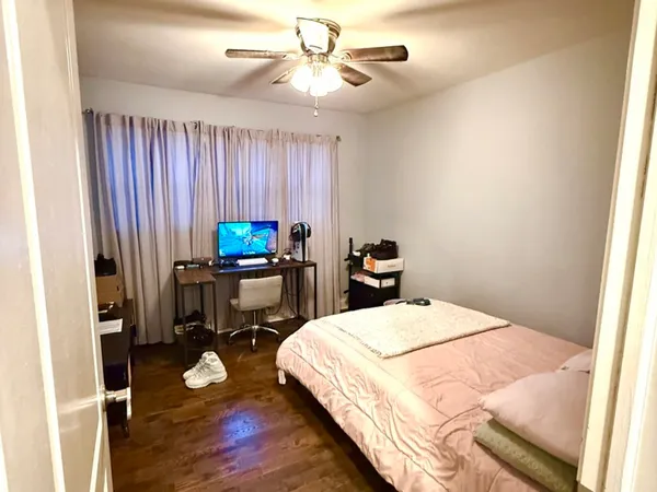 a bed room with a bed and a table