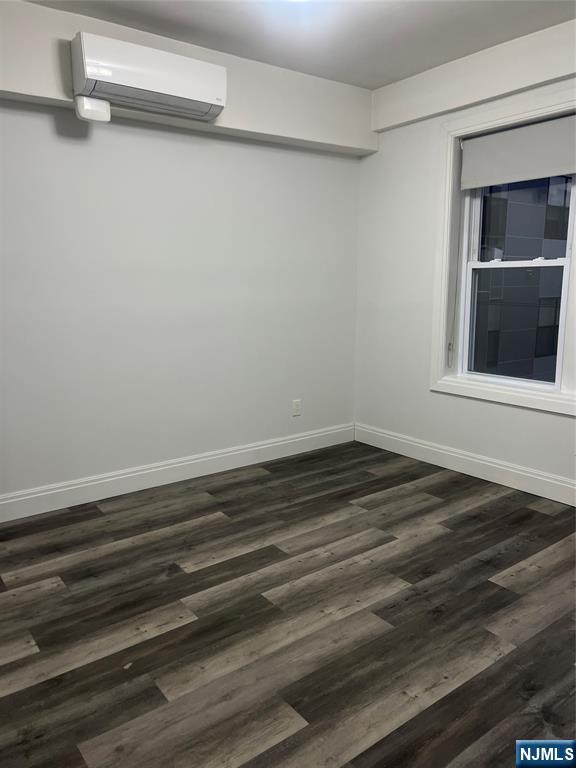 104 Park Avenue Rutherford, NJ 07070 - Photo 12 of 12 a view of a room with wooden floor and a window