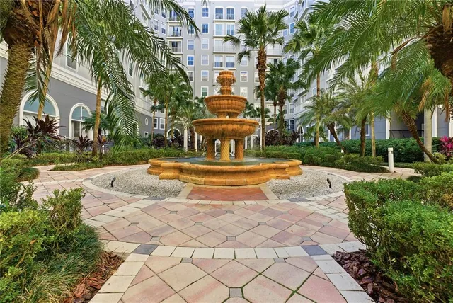 a view of fountain along with trees