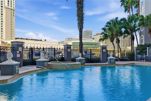 a view of a swimming pool with a terrace