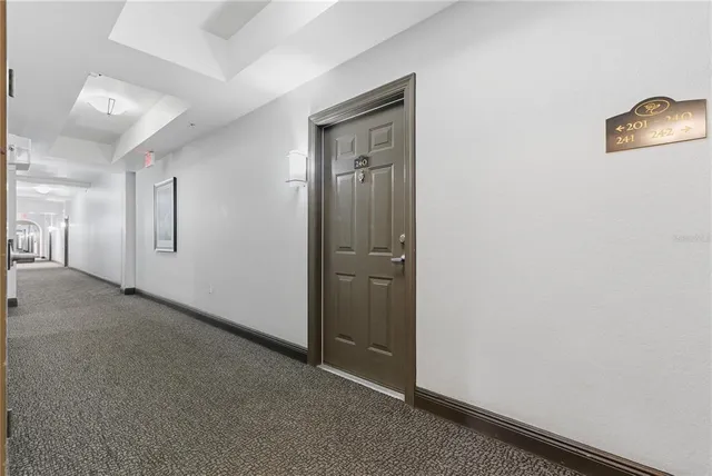 a view of a hallway with closet area