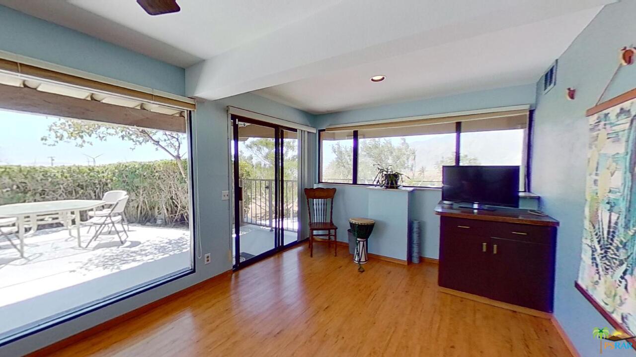 61612 Sagebrush Road North Palm Springs, CA 92258 - Photo 15 of 30 a workspace with furniture and window