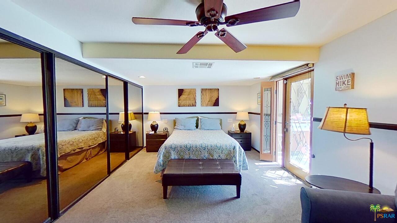 61612 Sagebrush Road North Palm Springs, CA 92258 - Photo 20 of 30 a bedroom with a bed and window