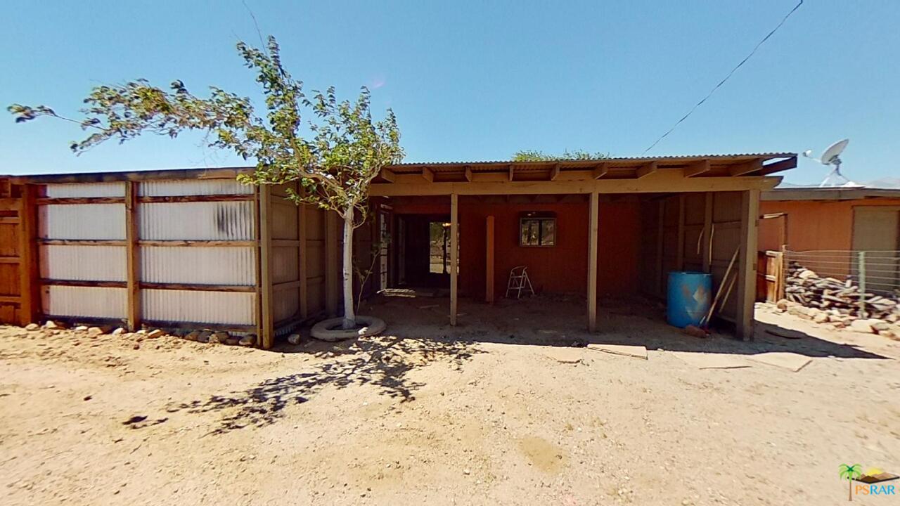 61612 Sagebrush Road North Palm Springs, CA 92258 - Photo 23 of 30 a view of a backyard of the house