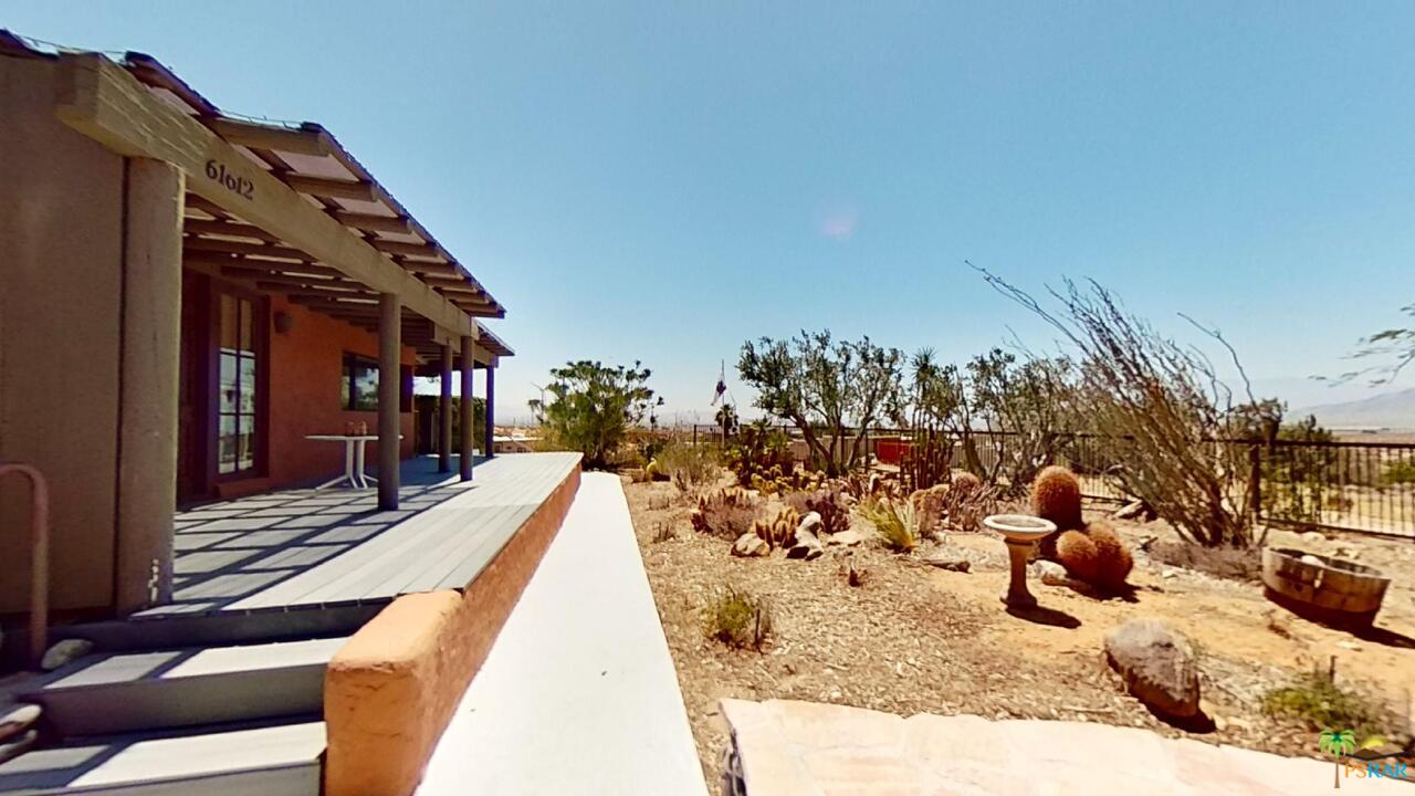 61612 Sagebrush Road North Palm Springs, CA 92258 - Photo 3 of 30 a view of a house with a patio