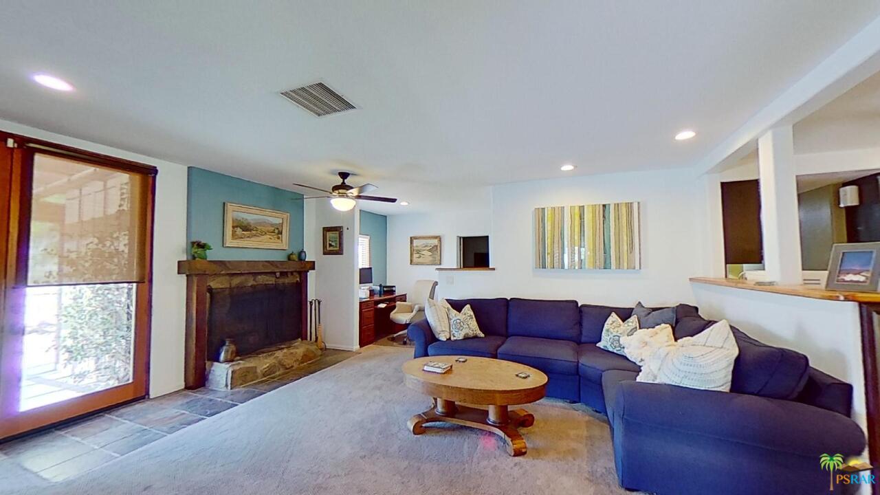 61612 Sagebrush Road North Palm Springs, CA 92258 - Photo 5 of 30 a living room with furniture and a window